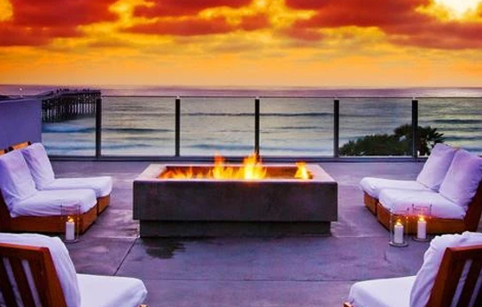 scenic bonfire with an ocean view