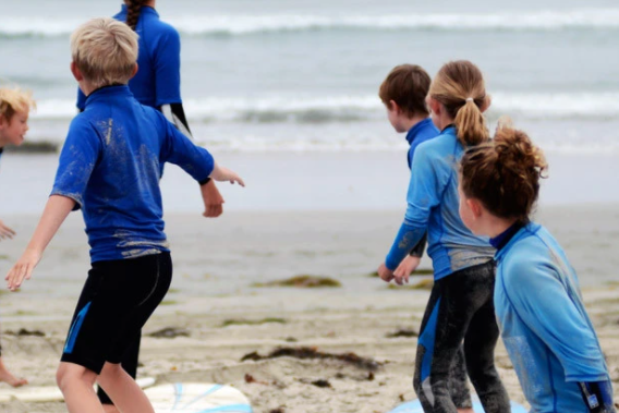group surf lesson surf camp